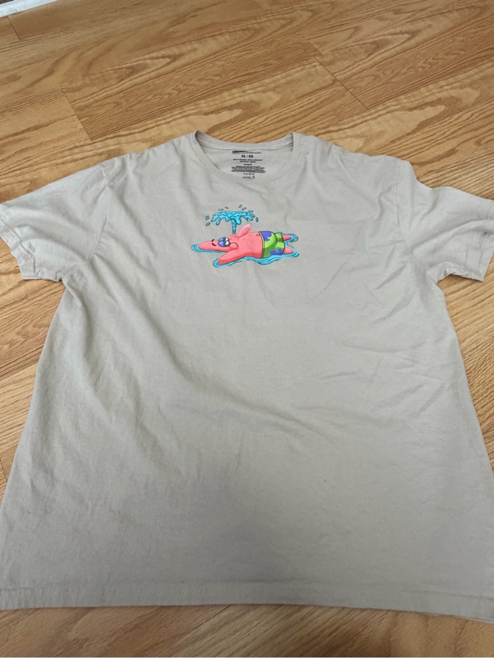 Gray Nickelodeon Patrick Star cotton t-shirt with pink starfish graphic, size XL